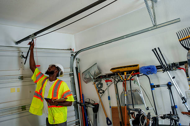 Professional Garage Door Panel Replacement technician working in Chesaning, MI